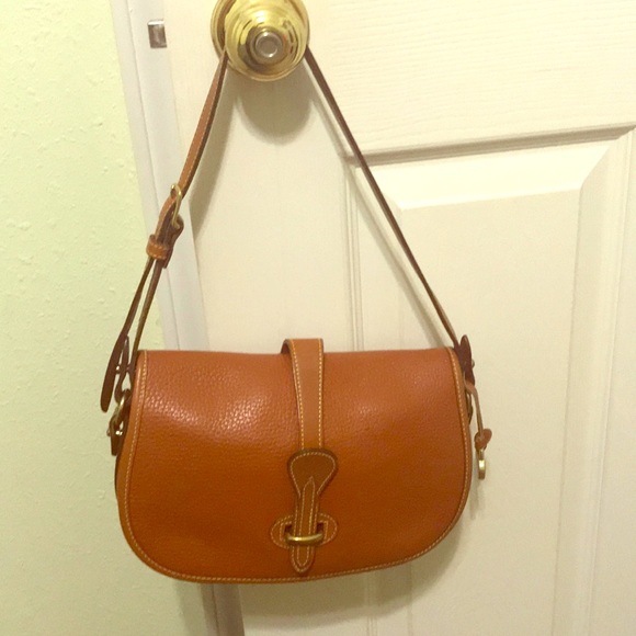 Dooney & Bourke Handbags - Brown leather purse